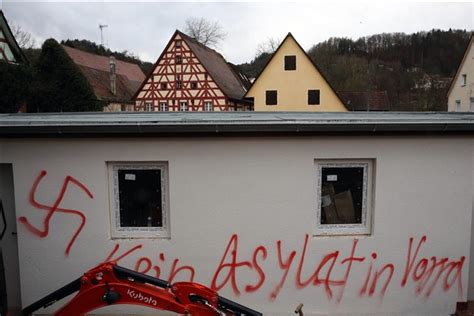 Germany detains 2nd man over fatal arson attack on refugee shelter in 1991